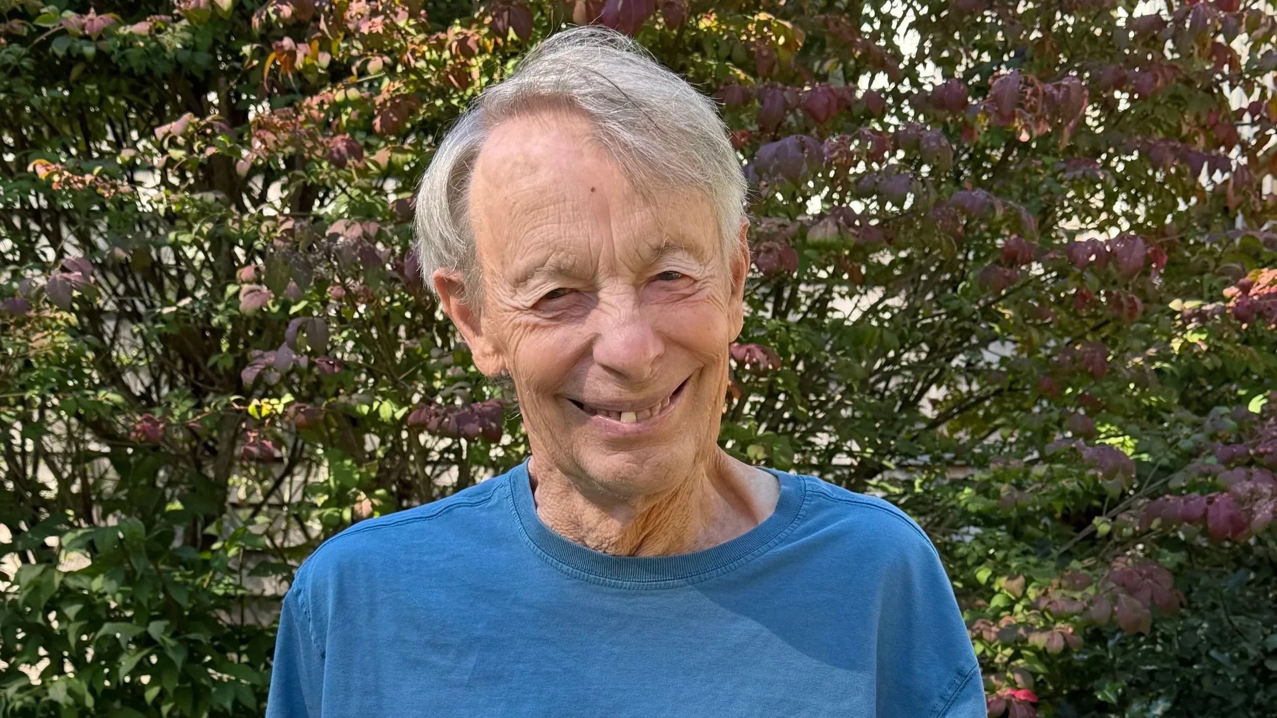 Harold van Doren headshot outside 2025.jpg