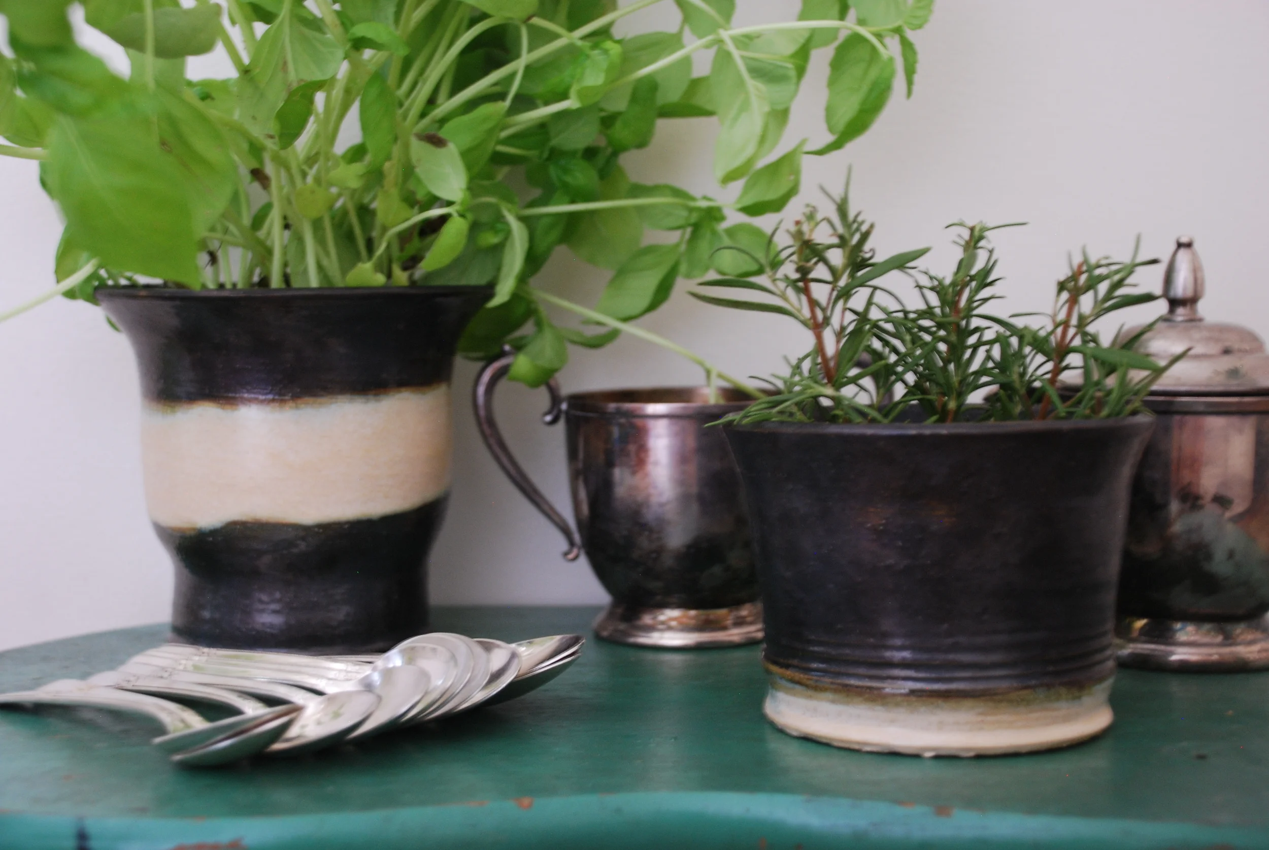  Ceramic Pots&nbsp;  Tall pot: 8" high by 6" wide  Short pot 5" high 5" wide 