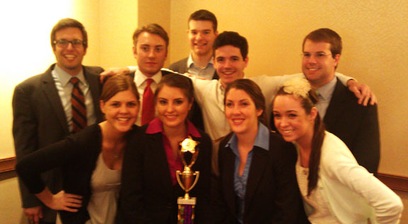 Miami B (left to right) Joe Luizzi (2012), Katie Law (2013), Mike Rhodes (2013), Daniella Pierre-Bravo (2013), Neal Schuett, Tyler Abely (2013), Lauren Yates (2014), Julie Luizzi (2014), Mike Woeste (2013)