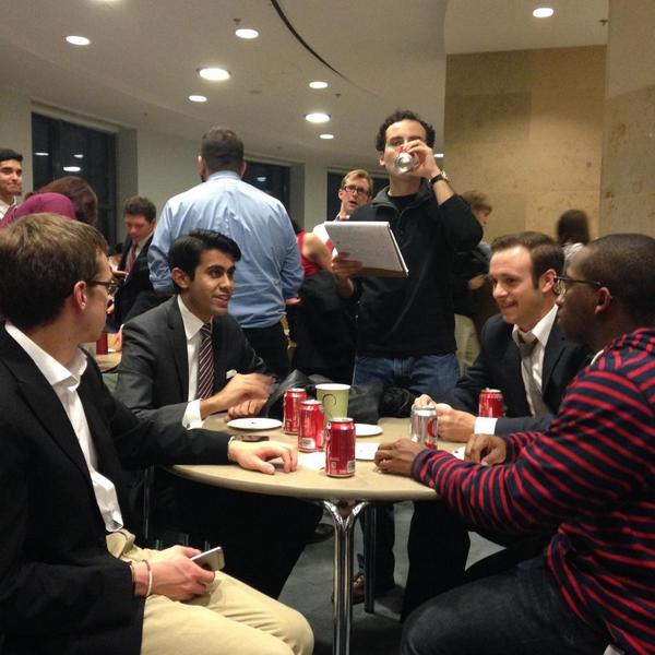Competitors Elias Demeropolis, Najeeb Ahmed, Coach Gus Lazares, Senior Taylor Seay, and Coach Lawrence Hilton unwind before closing ceremonies.