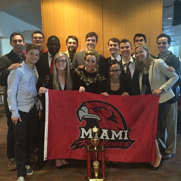 Miami 1075 (Left to Right): Alex Block (Coach), Adam Korn (2017), Neal Schuett (Coach), Imokhai Okolo (2017), Dani Kunkel (2018), Ben Sandlin (2016), Matt Meeks (2015), Katie O'Keeffe (2017), Henry Leaman (2017), Jazmine Kee (2017), John Spear (2016), Najeeb Ahmed (2016), Jaime Glinka (Coach), Gus Lazares (Coach).