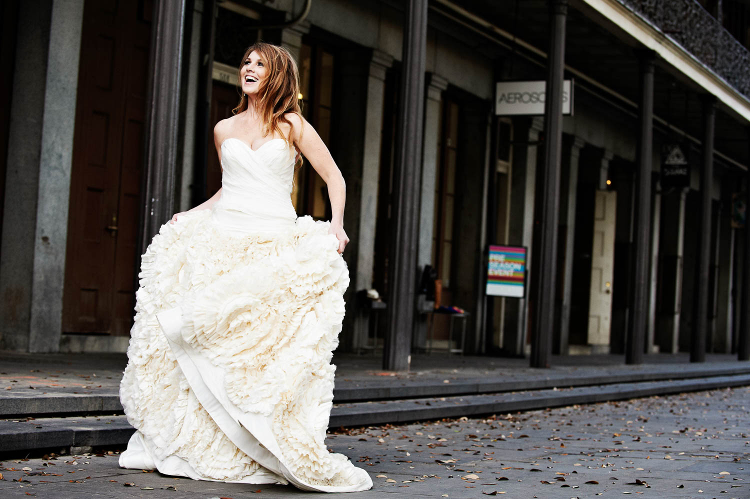 Exuberant bride in New Orleans street