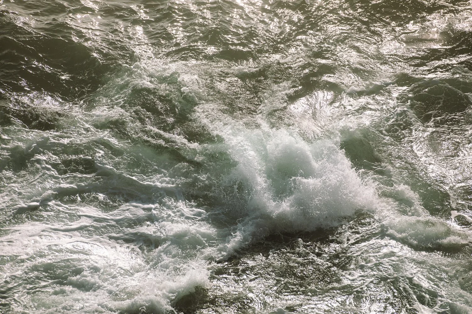 Powerful ocean waves crashing along the Maine coast in Acadia National Park