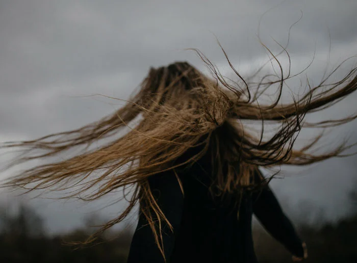 hair blowing in the wind.jpg