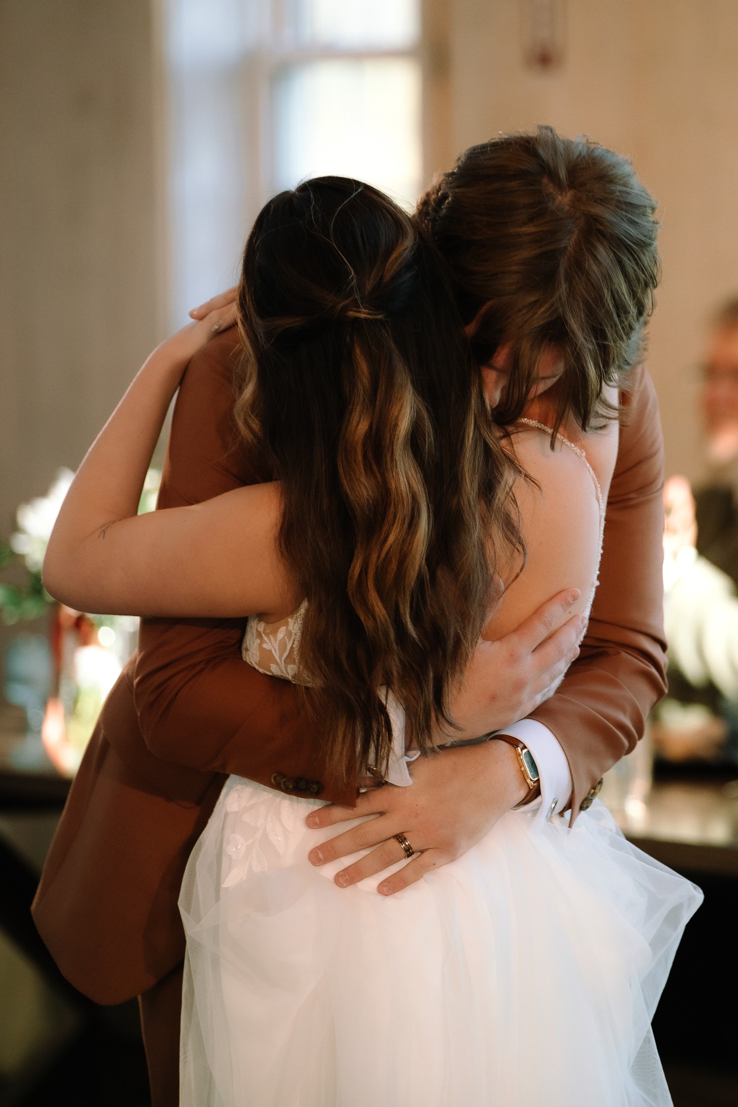 Bride and groom embracing during the reception at their Ivory Meadows wedding in Dayton, Ohio.