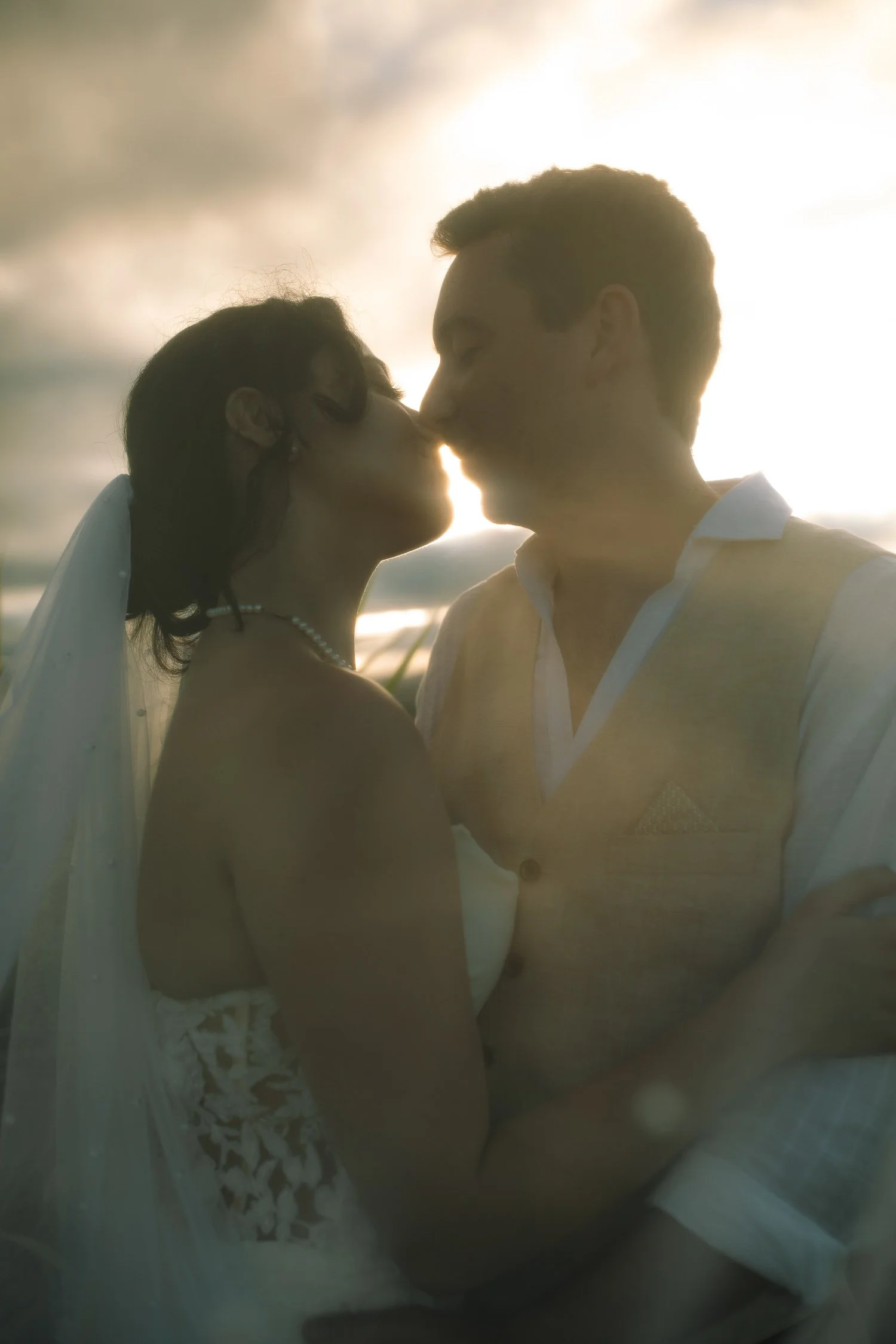 Silhouetted kiss at sunset during a Cerro Mime mountain elopement in Puerto Rico
