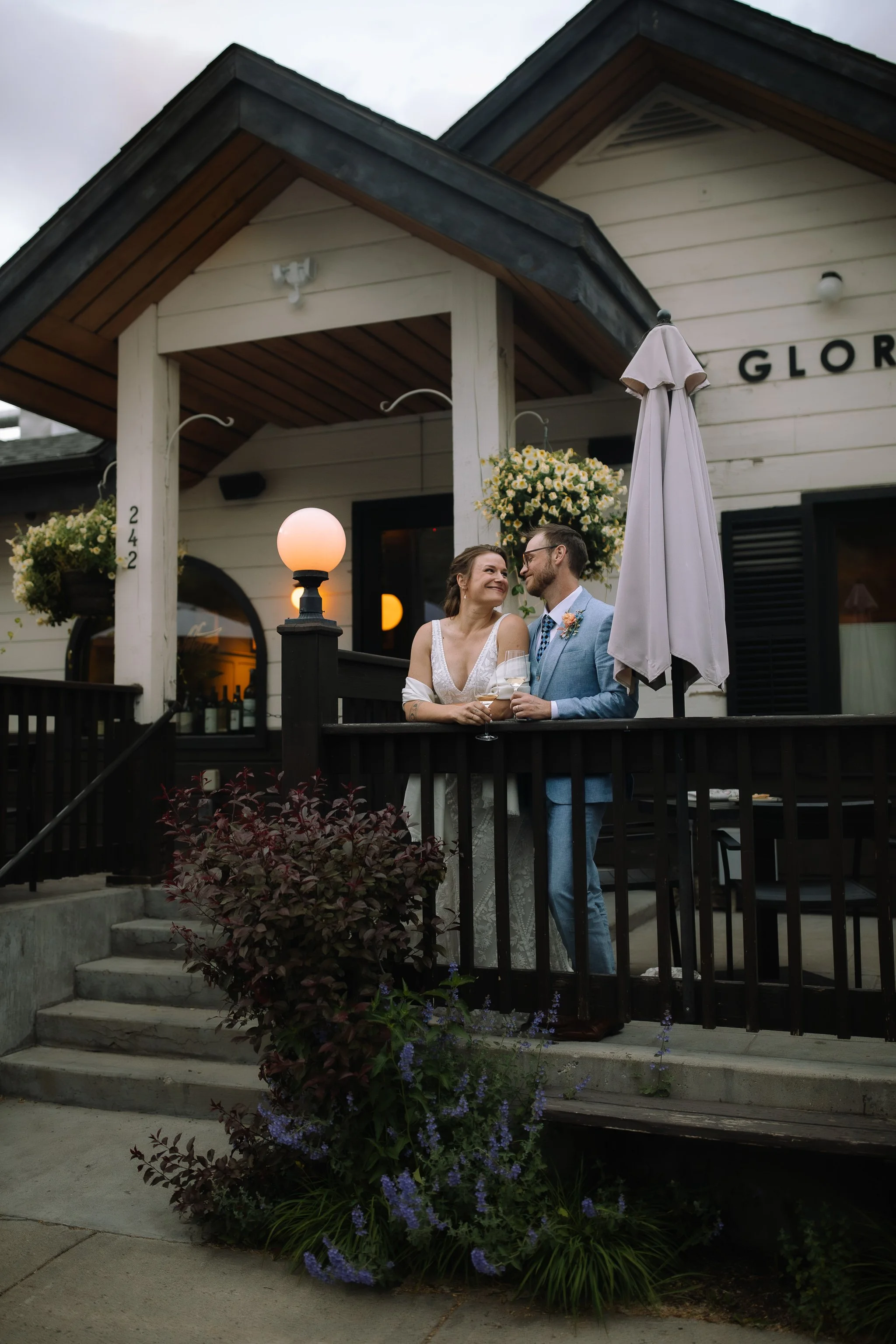 Couple sharing a quiet moment together on a restaurant patio in Jackson Hole after their elopement