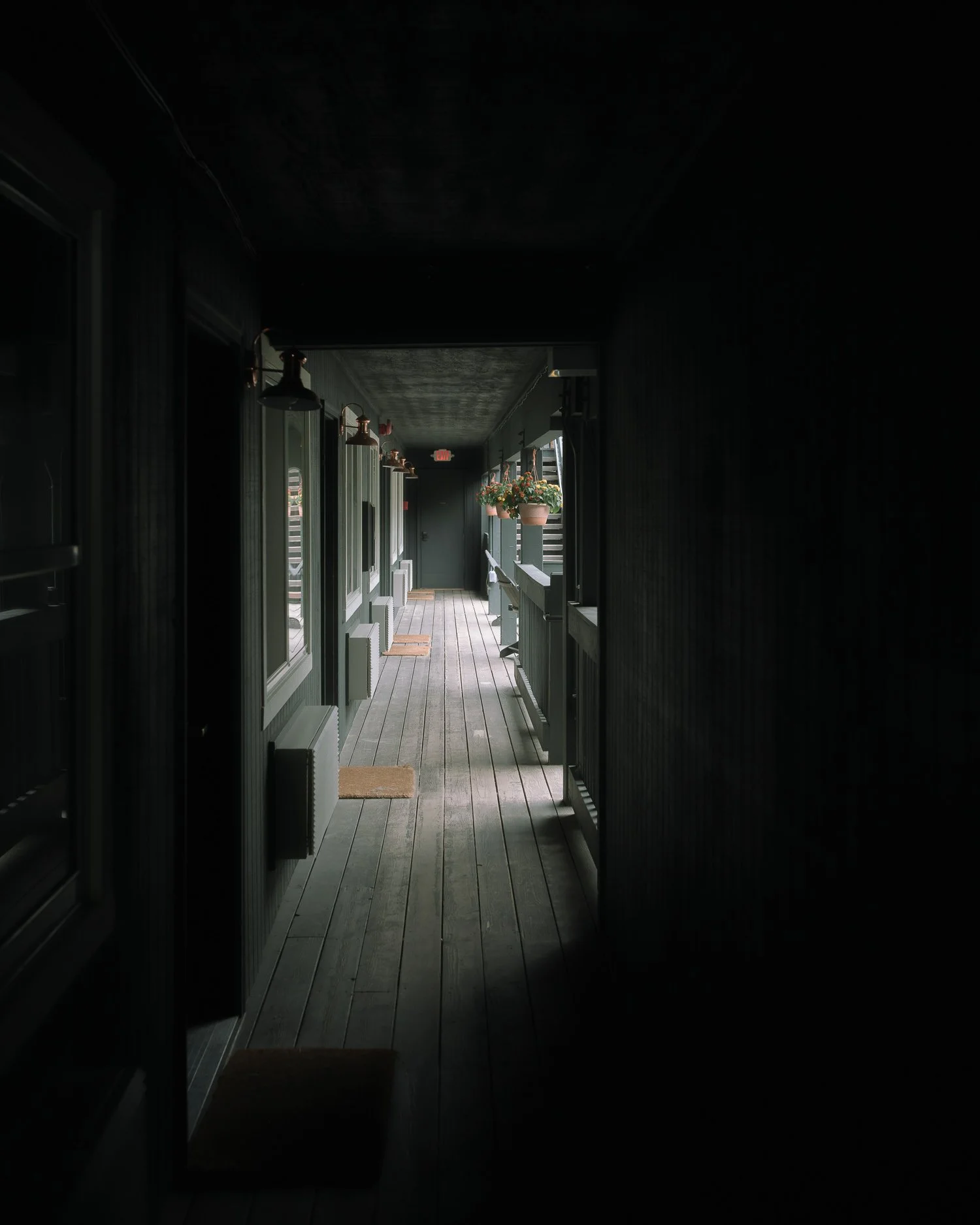 Moody covered hallway at Anvil Hotel in Jackson Hole, Wyoming