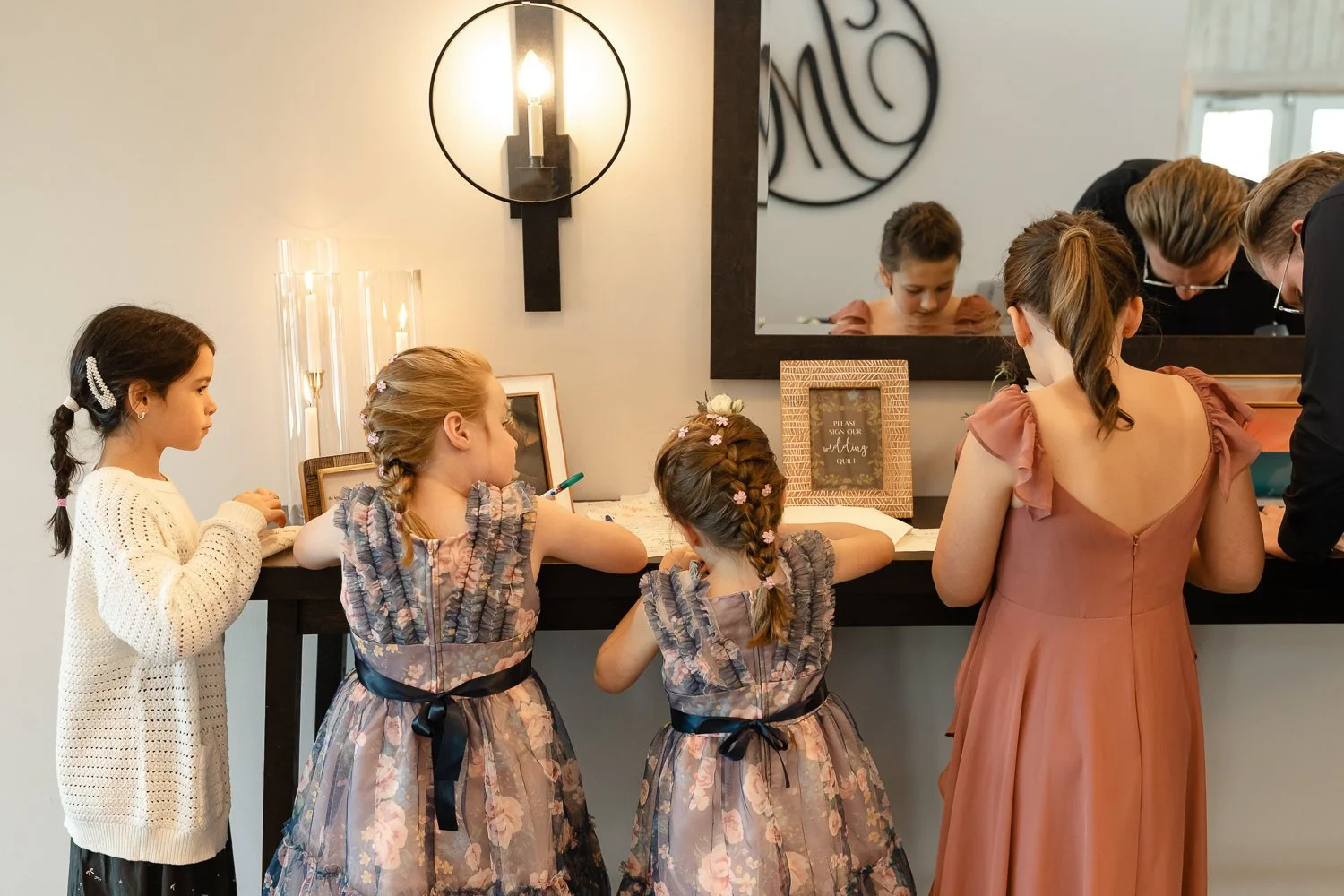 Children signing the guest book during a wedding reception at Ivory Meadows in Dayton, Ohio.