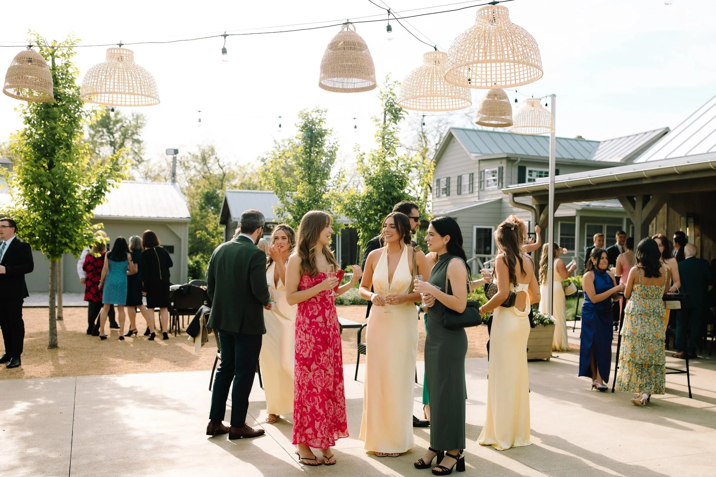 Guests mingling during cocktail hour in the courtyard at Jorgensen Farm The Gardens in Columbus.