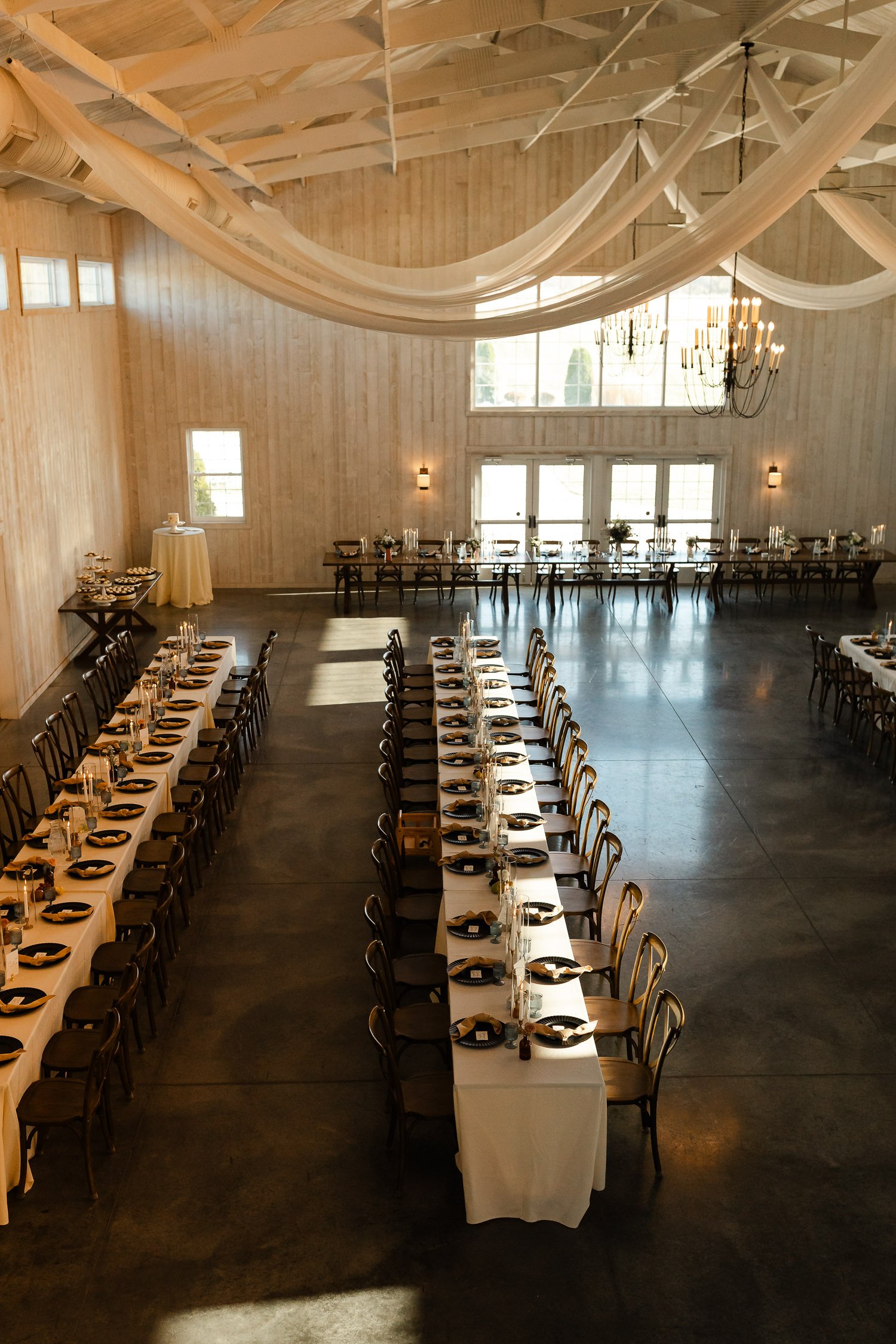 Overhead view of the Ivory Meadows wedding reception layout with long tables and candlelight in Dayton, Ohio