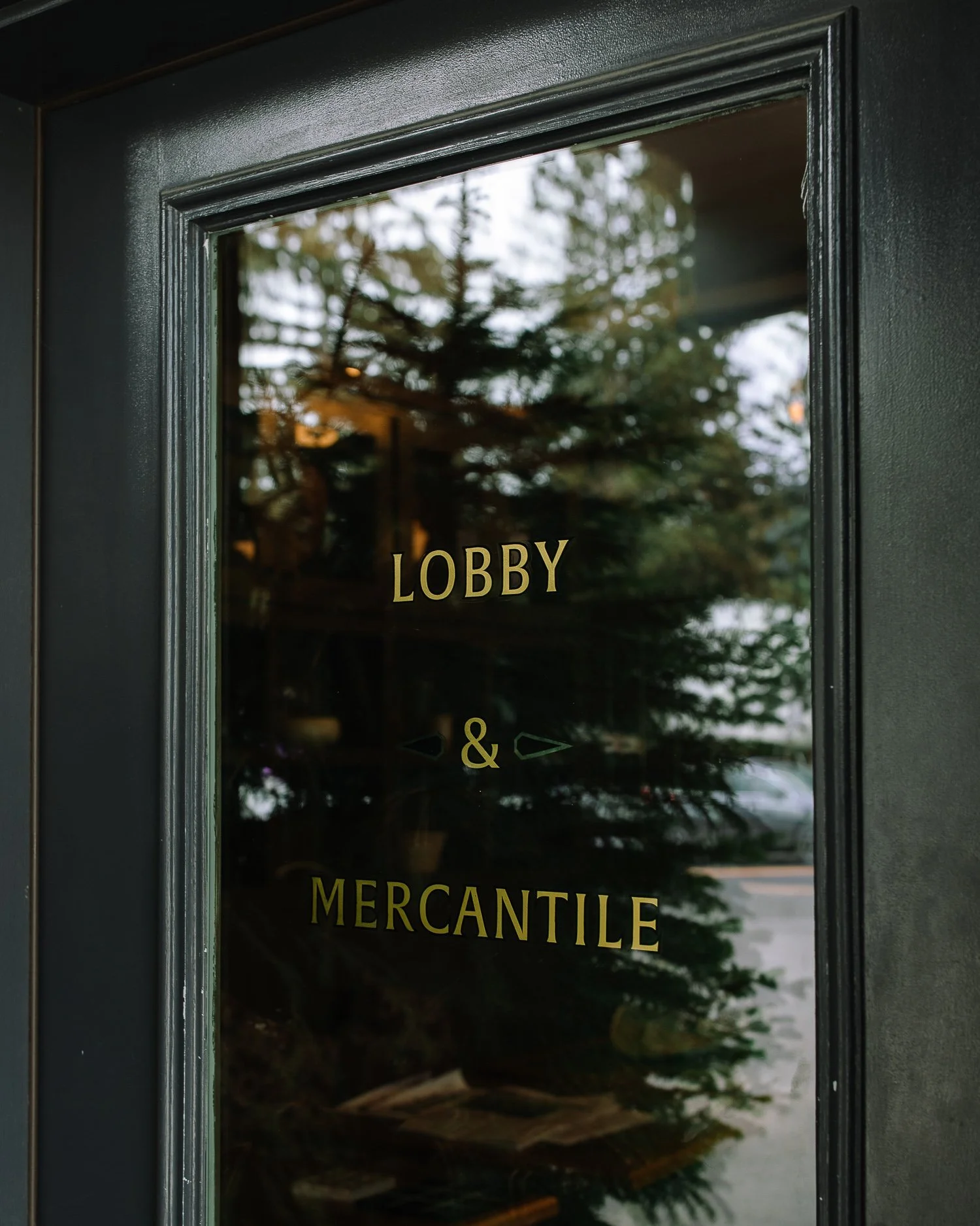 Entrance door to the lobby and mercantile at Anvil Hotel in Jackson Hole, Wyoming