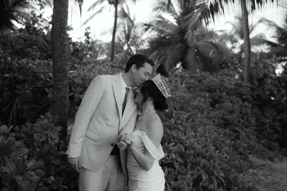 Black and white wedding portrait of a couple sharing a quiet moment during their La Concha Resort wedding in Puerto Rico.