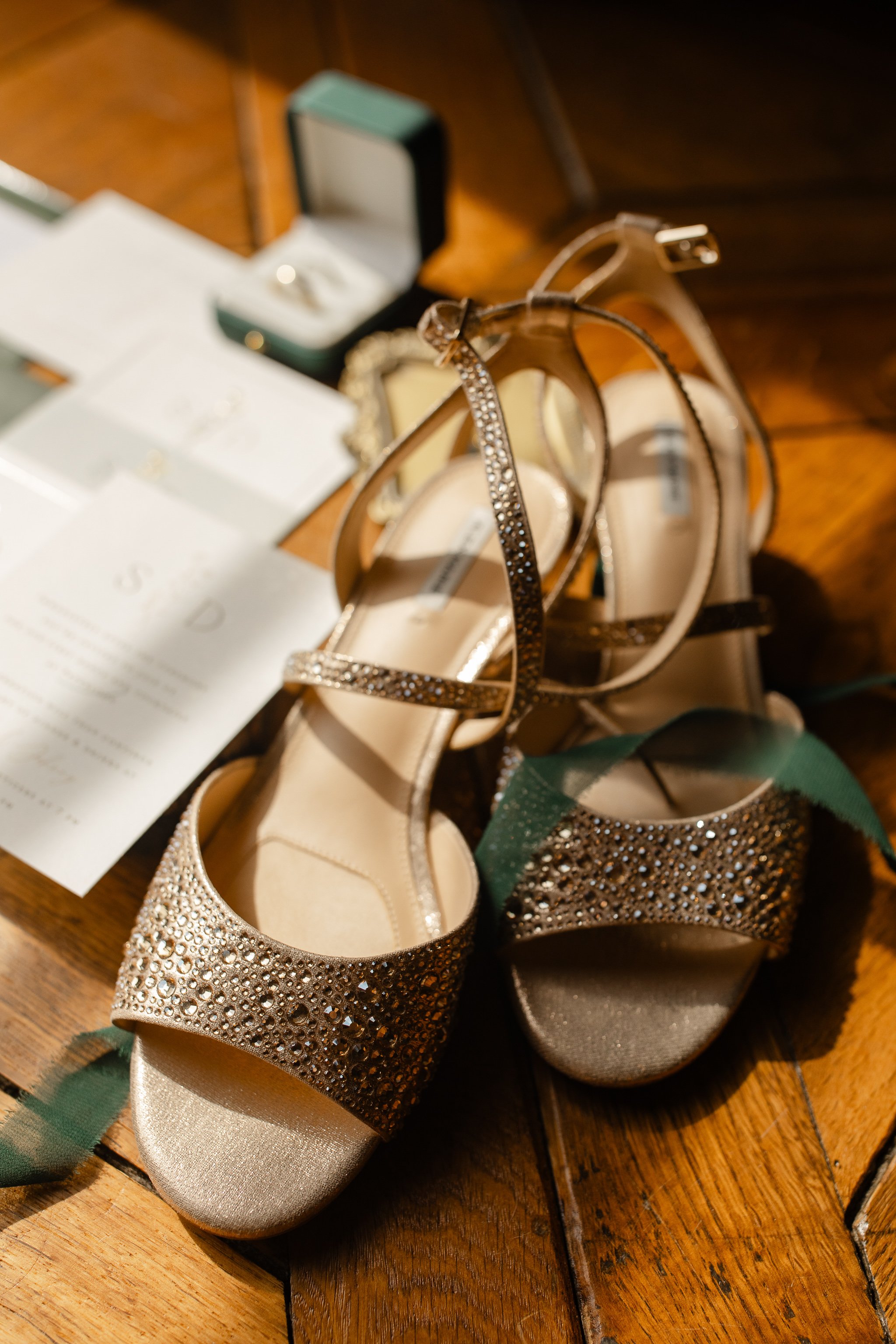 Bridal shoes with embellishments photographed during getting ready at Peterloon Estate