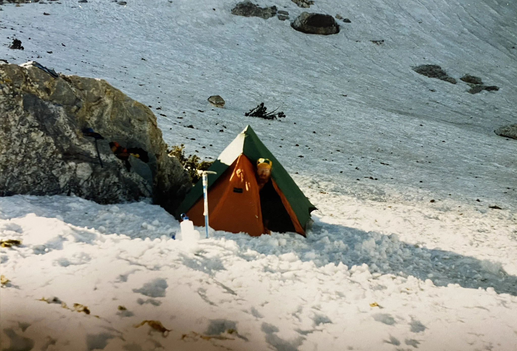 Vintage mountaineering base camp tent in snow in the Tetons, old climbing photograph