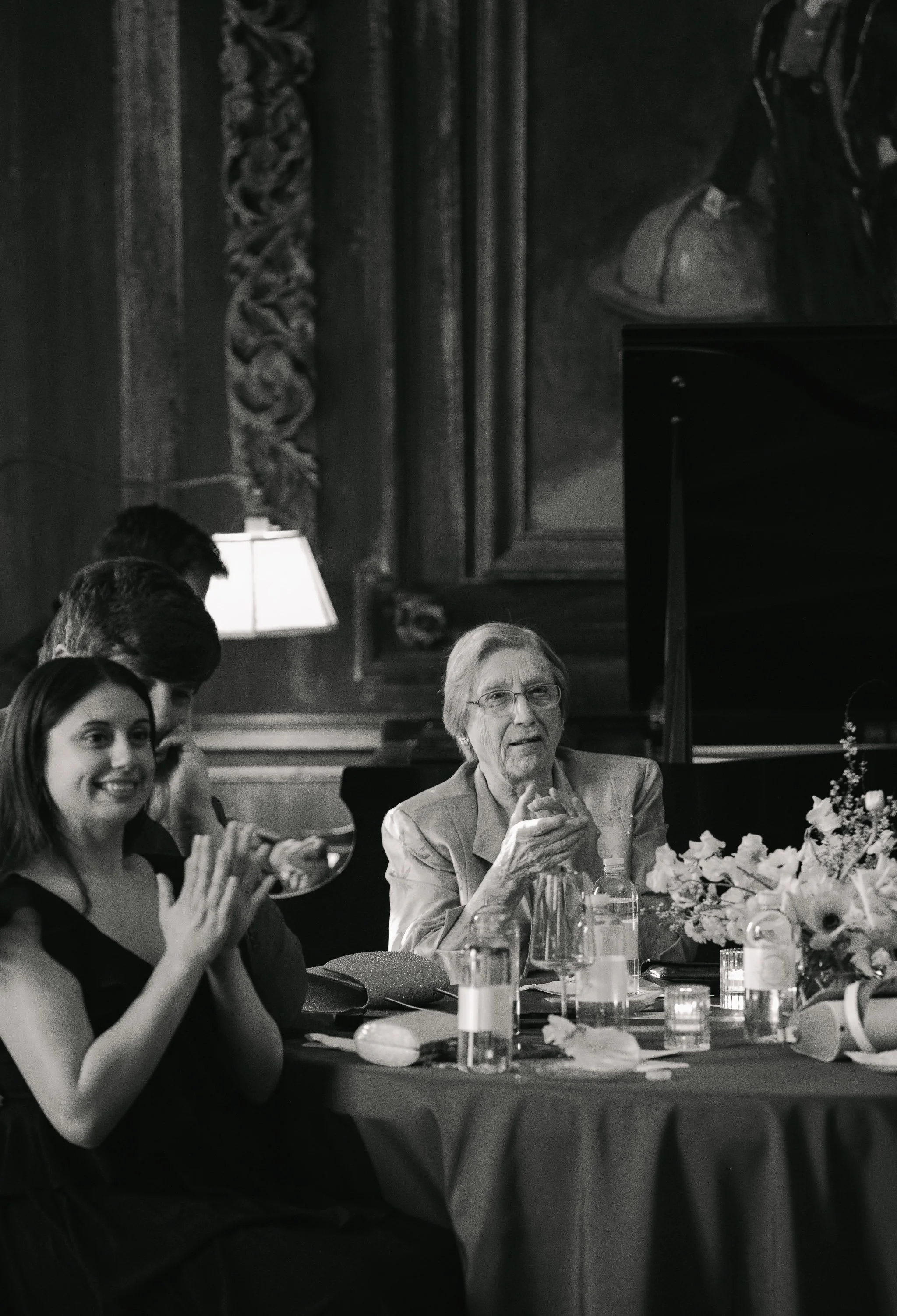 Guests clapping and smiling during cocktail hour