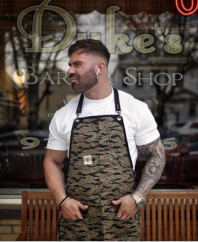 @xbigwesx wearing our TIGER STRIPE CAMO CORE APRON - Durable classic- length apron, perfect coverage for chest to mid thigh. SHOP NOW!!! Shop WWW.KNIFEFLAG.COM - link in bio #knifeandflag #knifeflag #survivalunion #barber #chef #mechanic #artist #tat