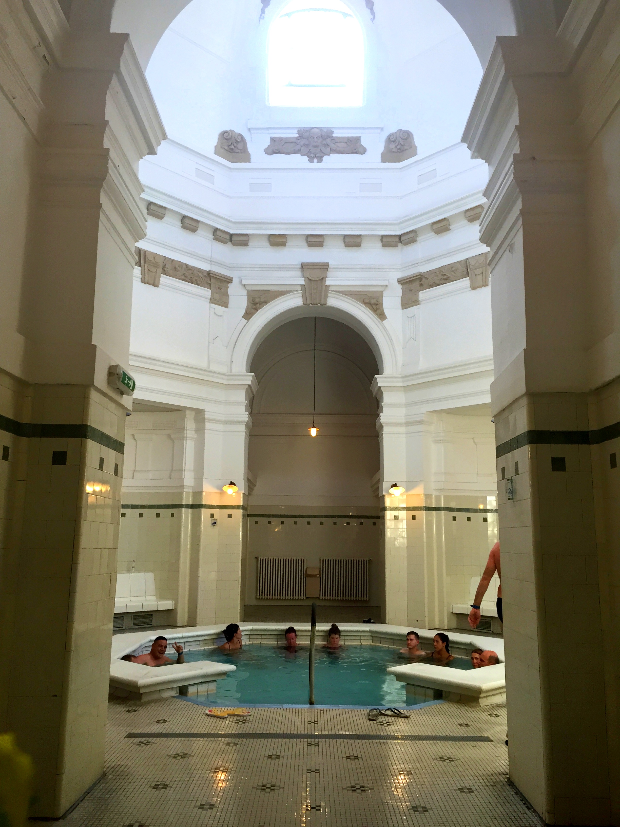 Taking part in a favorite pastime at the largest thermal bath in Europe, Szechenyi Baths. 