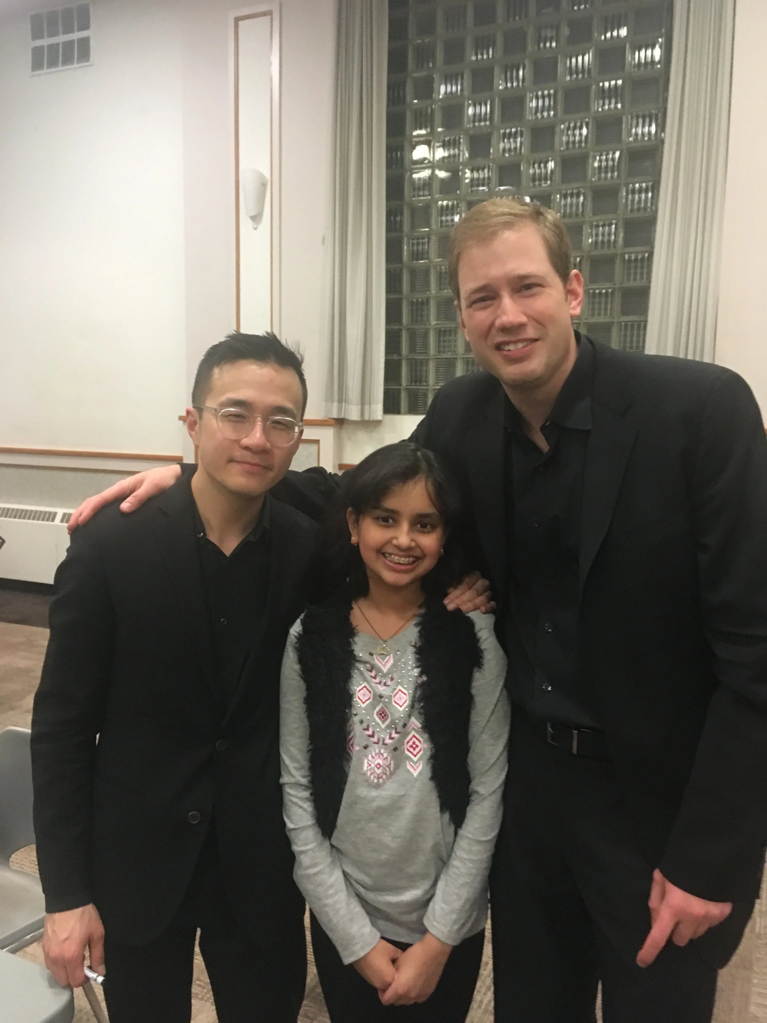 Sejutee, with violinists Andrew Wan and Jonathan Crow.