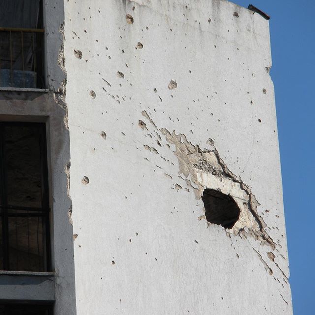 Damaged building in Mostar, Bosnia #wardestruction #urbanpatterns #urbanexploration #wynspeare #bosnia #mostar #terriblebeauty