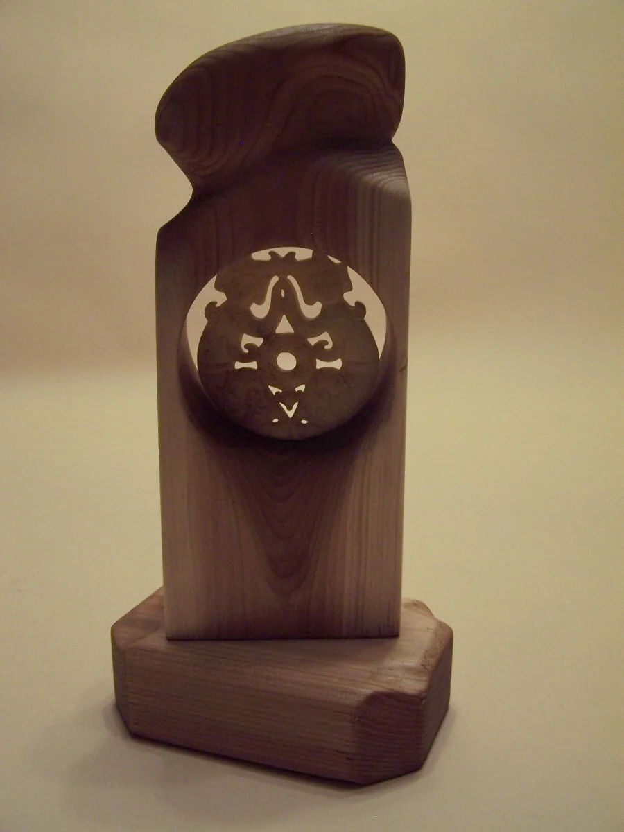 Pine and carved jade