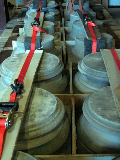 Now at our warehouse, these columns are a wonderful thing to see and feel. One notices the subtle slope or barrel rolled shape of each column. The chisel marks normally hidden by the capitals are now in full view. The massive solid lintels at 1700 lbs a piece are bigger or thicker than you would imagine adding to one's appreciation of this sedimentary rock.