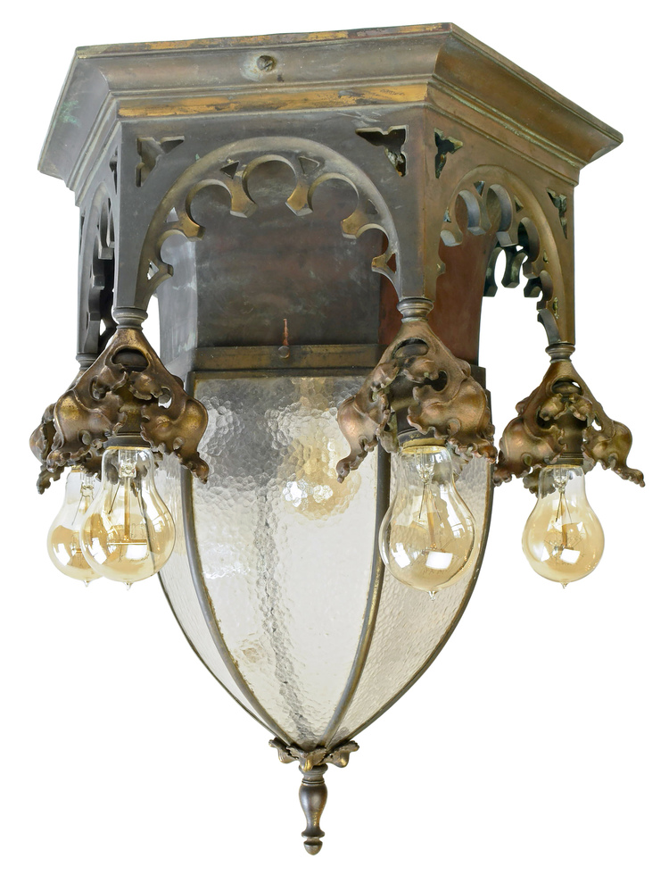 early 20th century cast bronze gothic fixture with bent glass shade