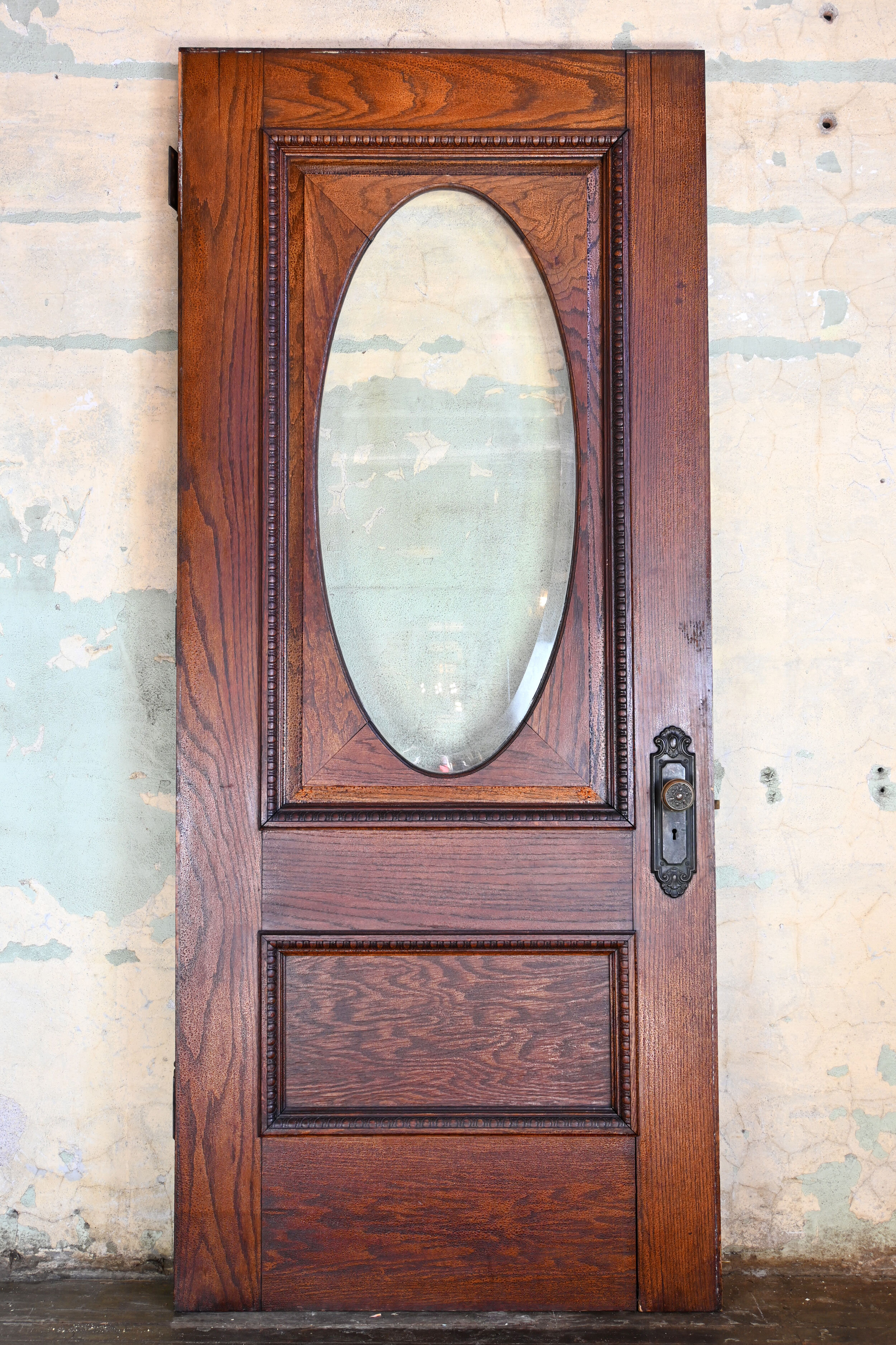 dark oak entry door with oval window — ARCHITECTURAL ANTIQUES