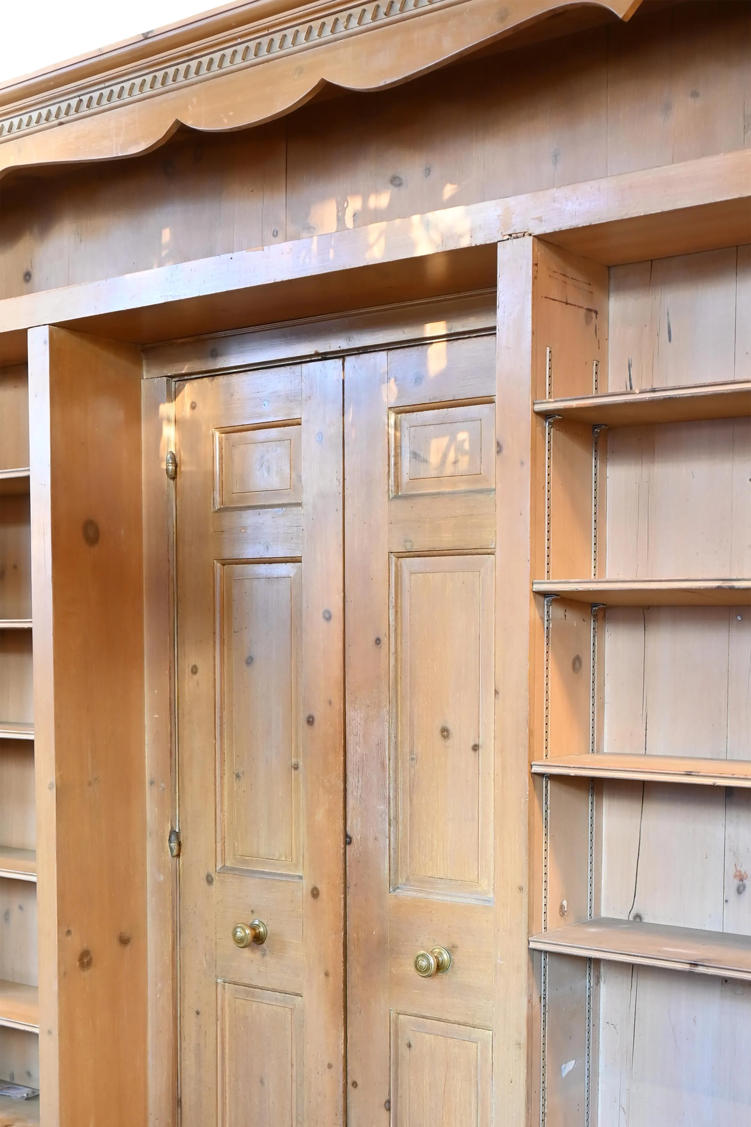 pine (pickled) seven foot bookcase with double door pass through
