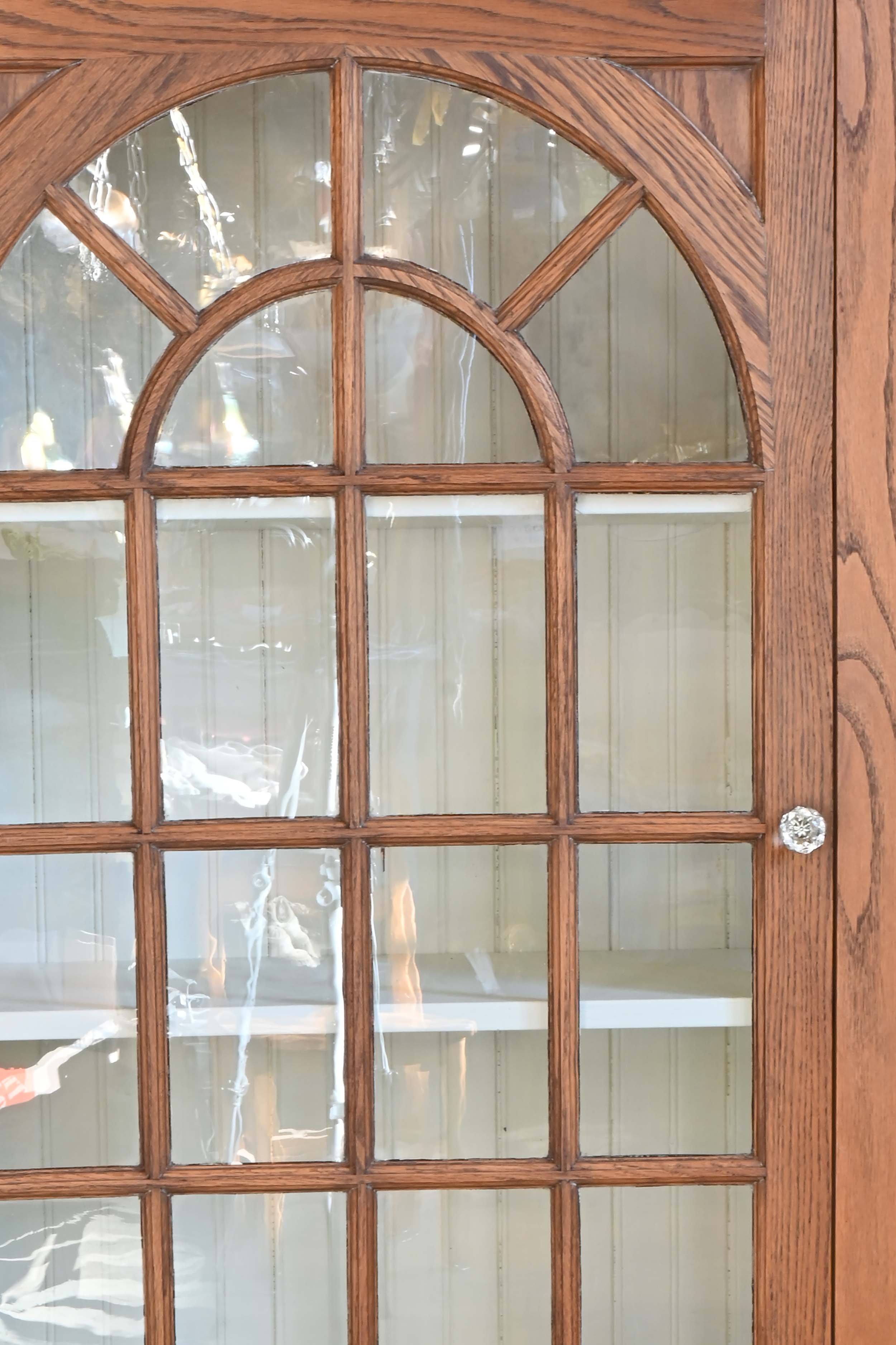 golden oak room divider bookcase pair with arched muntins and mullions