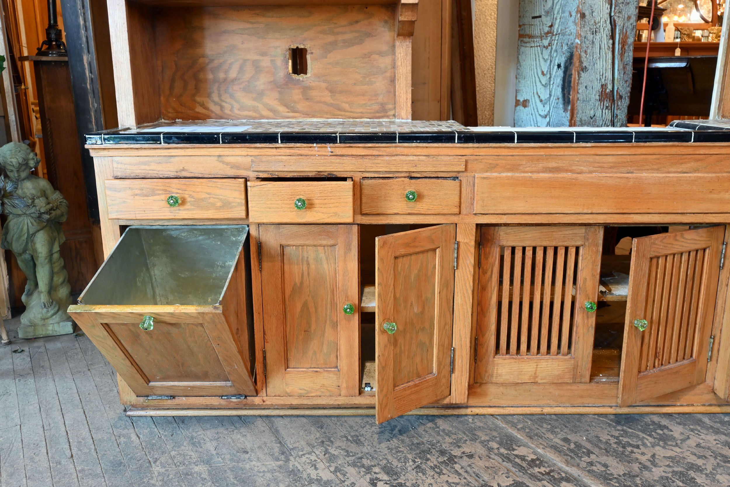 expansive craftsman kitchen unit with tiled counter and sink