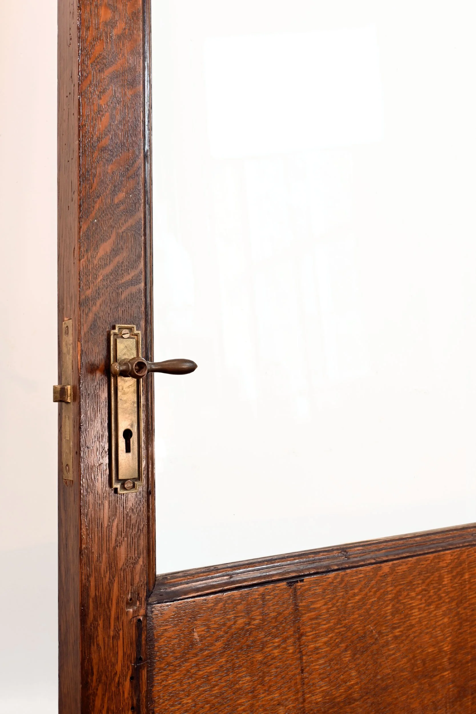 quarter sawn dark oak door with three quarter view window