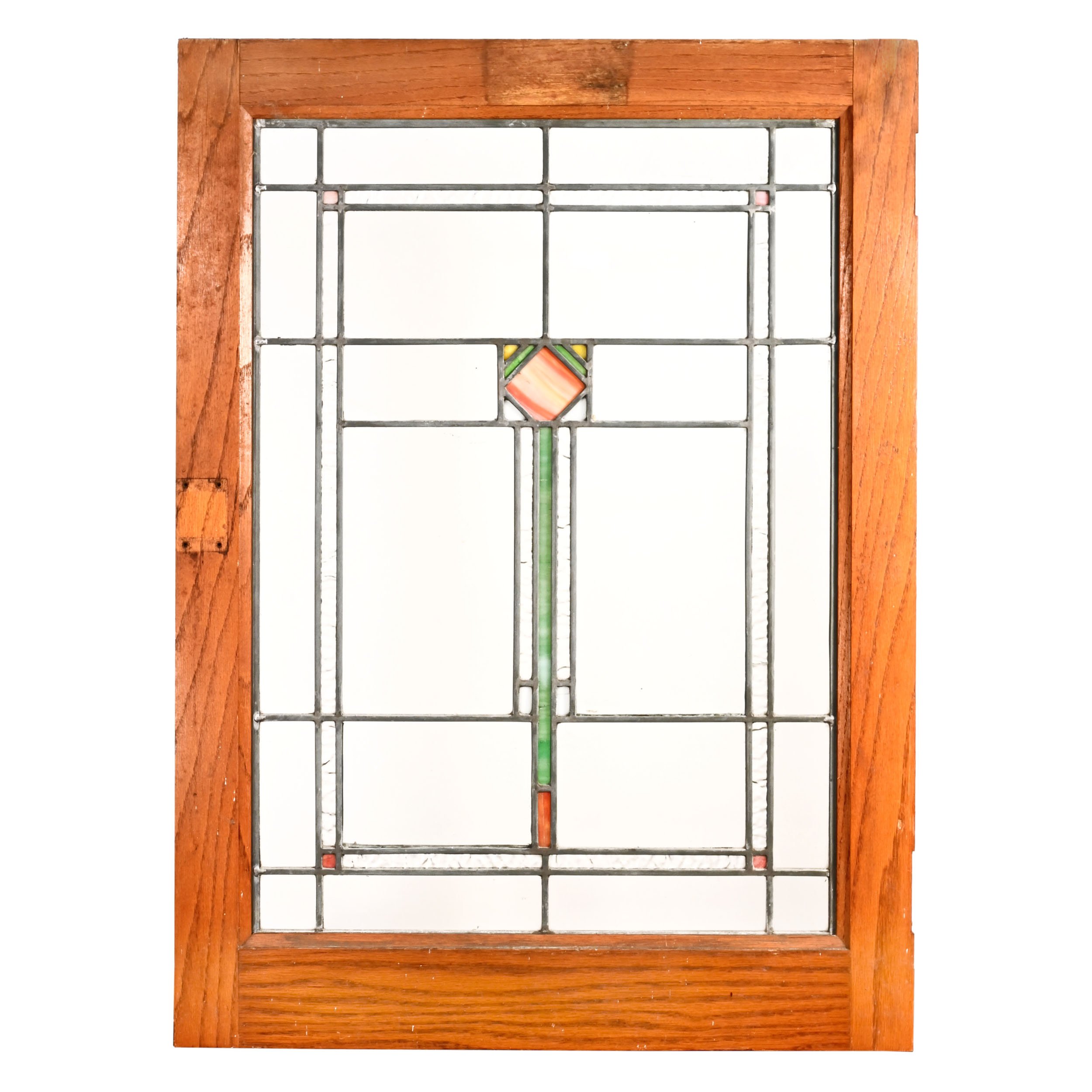 leaded glass window with pink and green slag glass accents