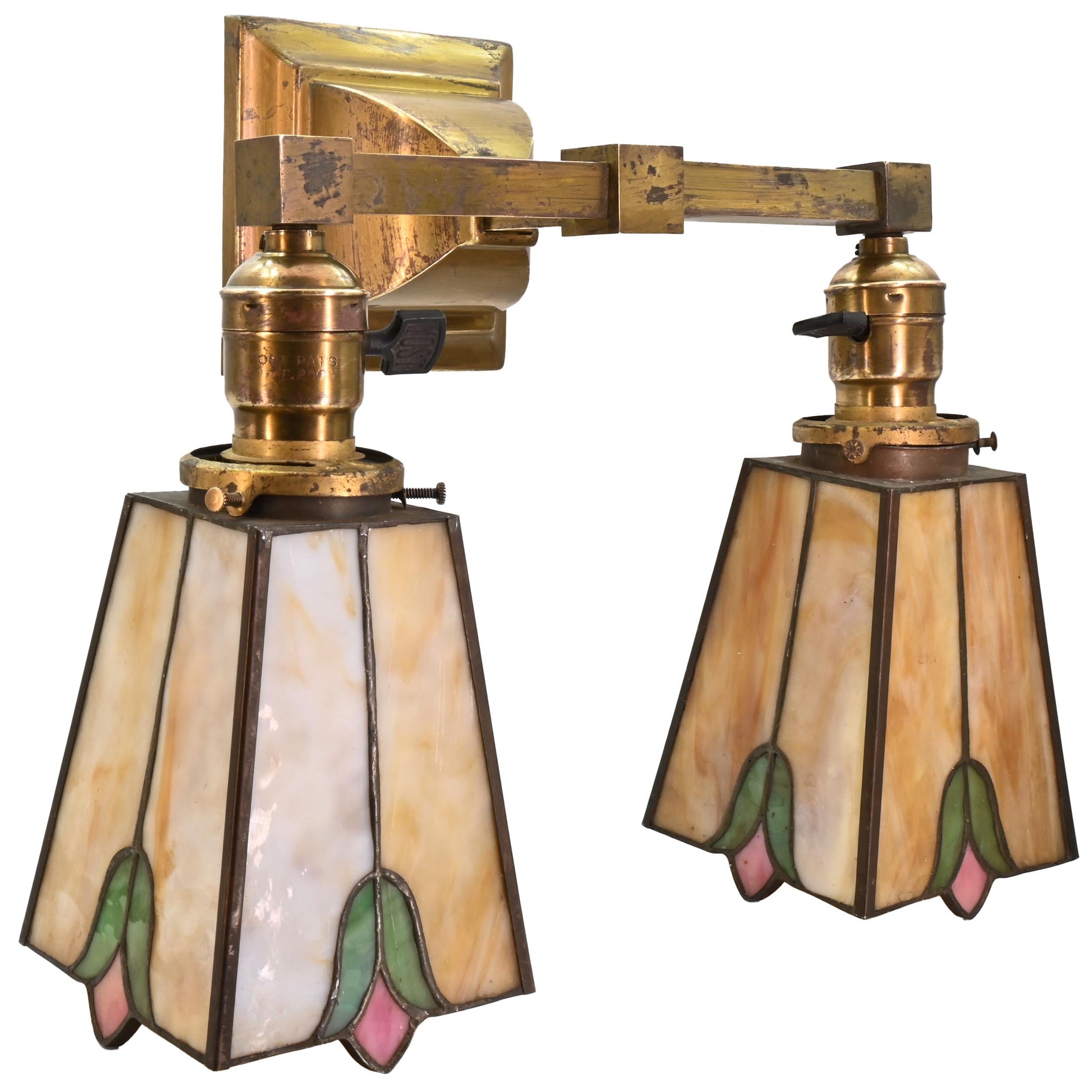 brass 2 arm sconce with copper foil glass shades
