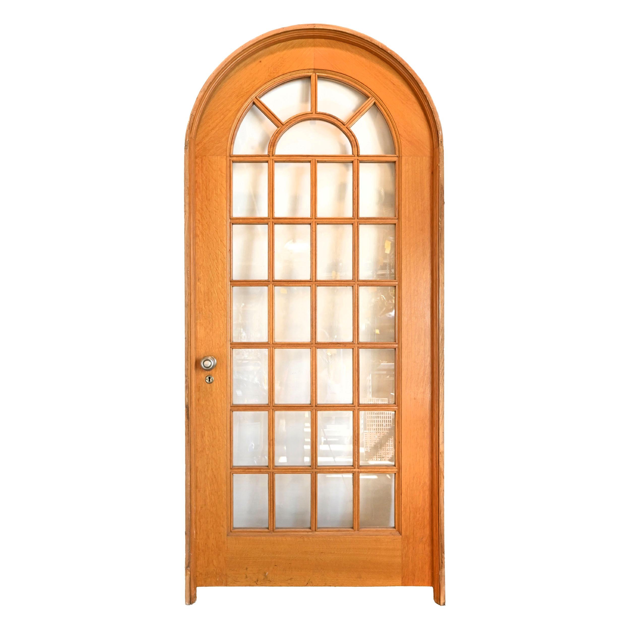 round arch quarter sawn full view divided light oak door in frame