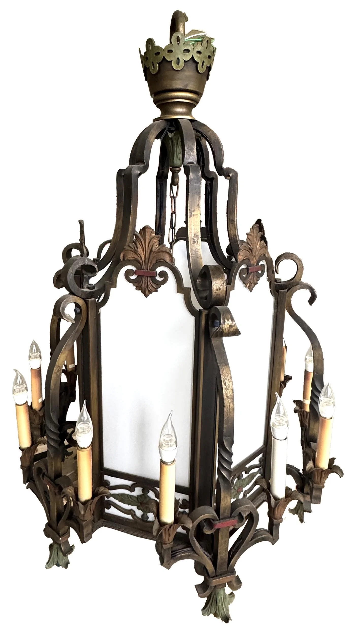 four foot diameter cast iron with original polychrome 18 light chandelier