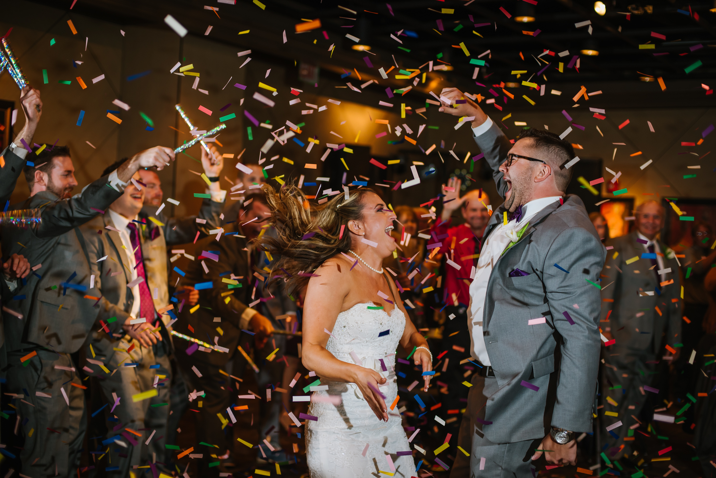 Allison and Pete have smiles that big pretty much 24/7 and when their wedding party threw confetti on them during the intros into their reaction it was priceless!&nbsp;