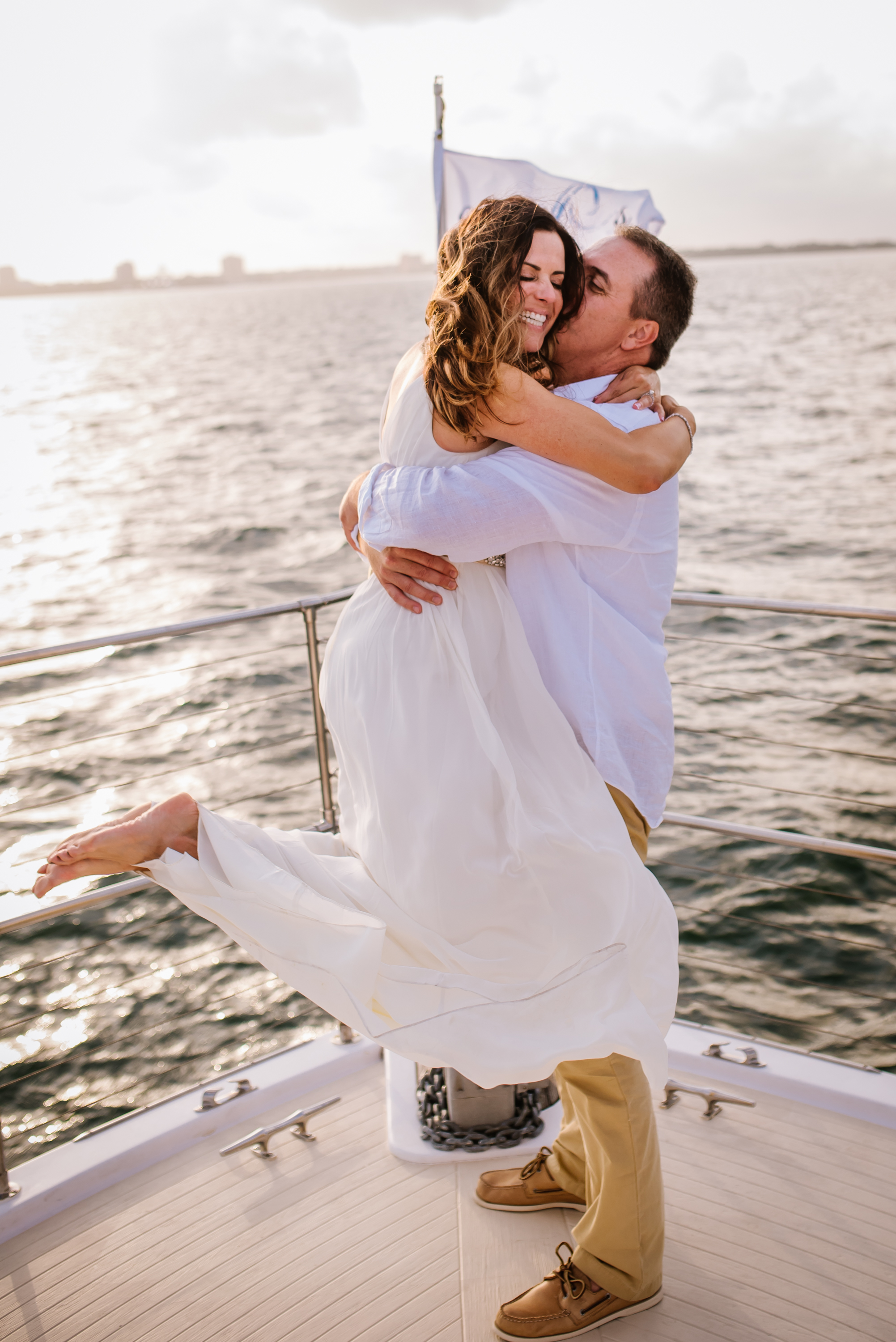 Sarai and Ryan are pretty much the Brady bunch only better. Their elopement aboard a private yacht on a sunset sail was so much fun!! Her excitement pretty much sums it up!