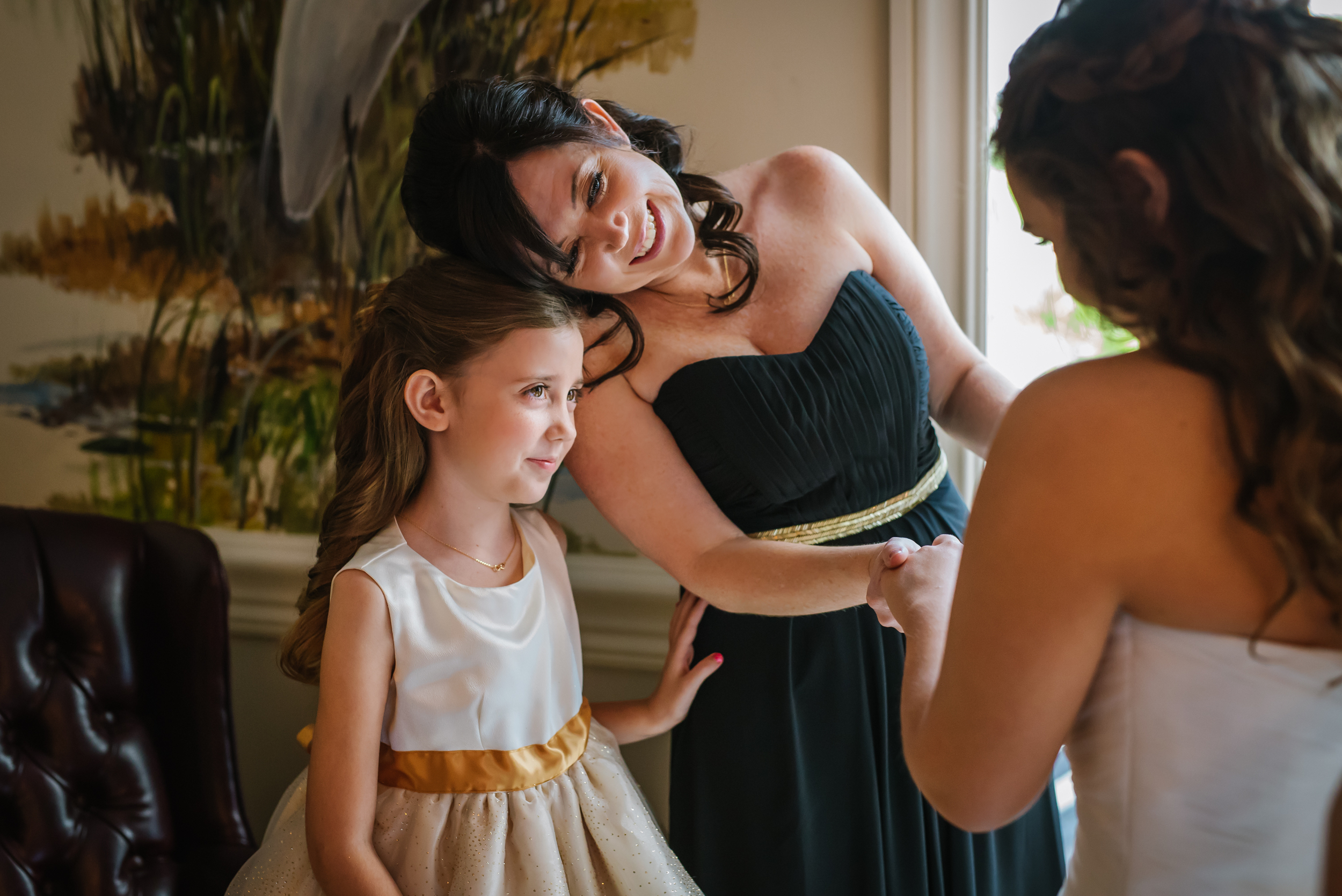 Katlin and Jarret were married at the Carleoul yacht club this fall. Her little niece/flower girl is too precious for words in this getting ready image.&nbsp;