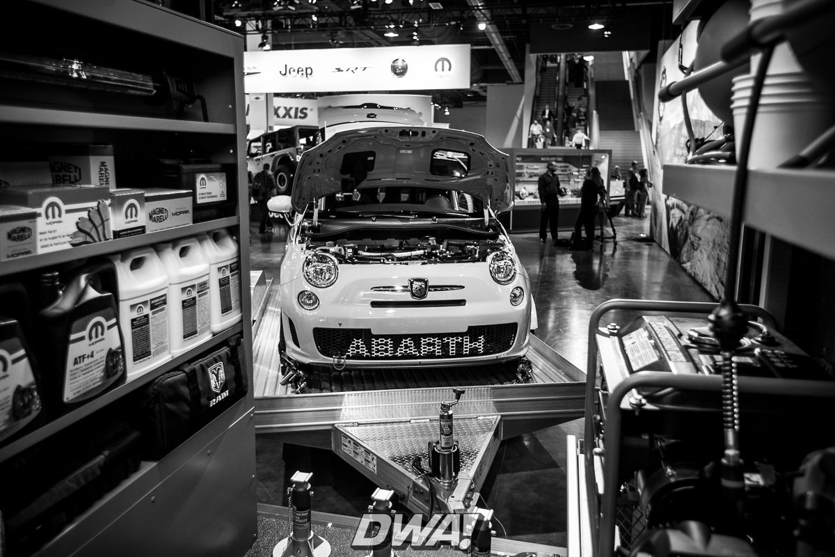 Fiat Abarth behind a Ram ProMaster Van