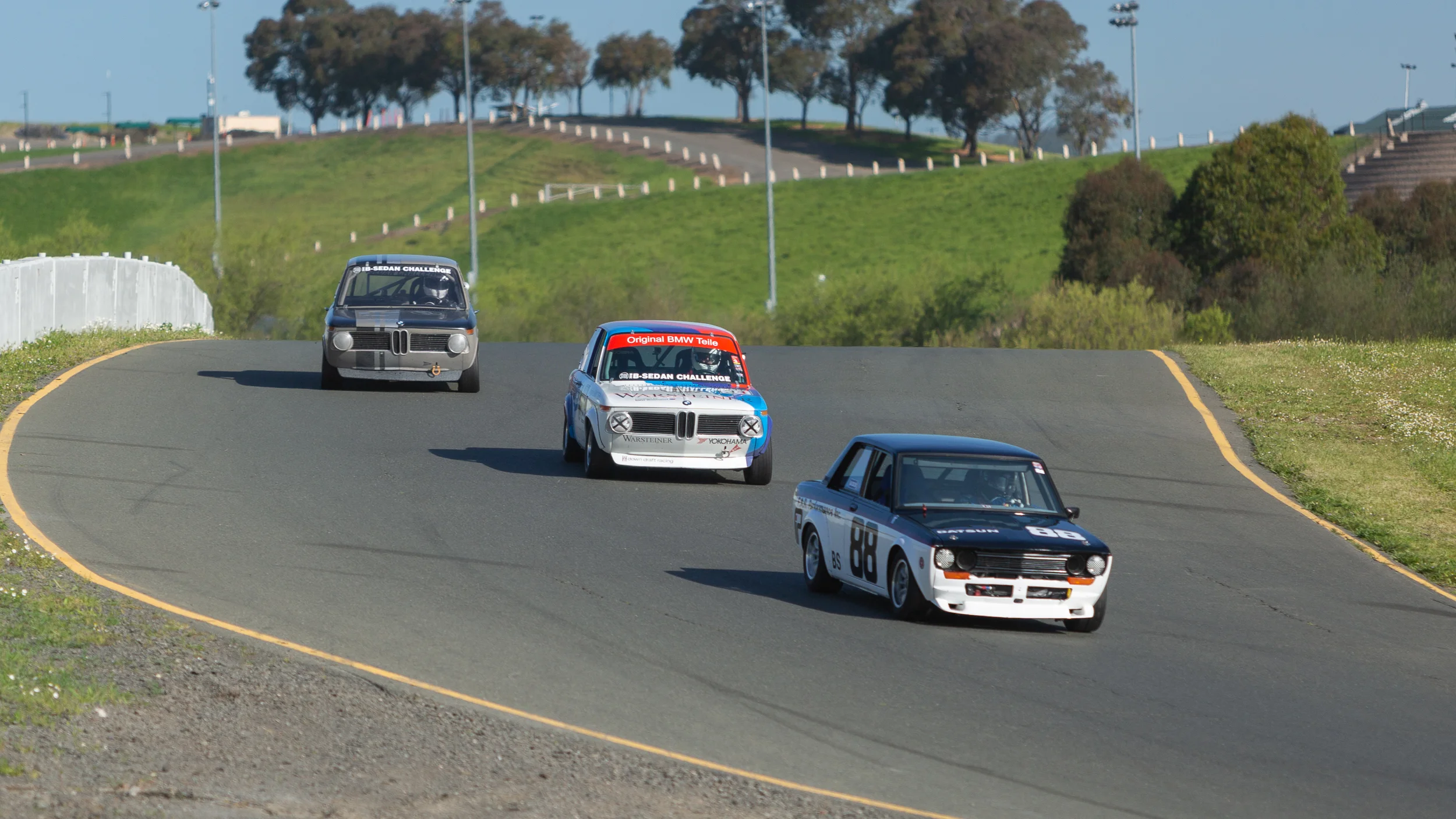 Battle of the B Sedans during the John Morton Cup race