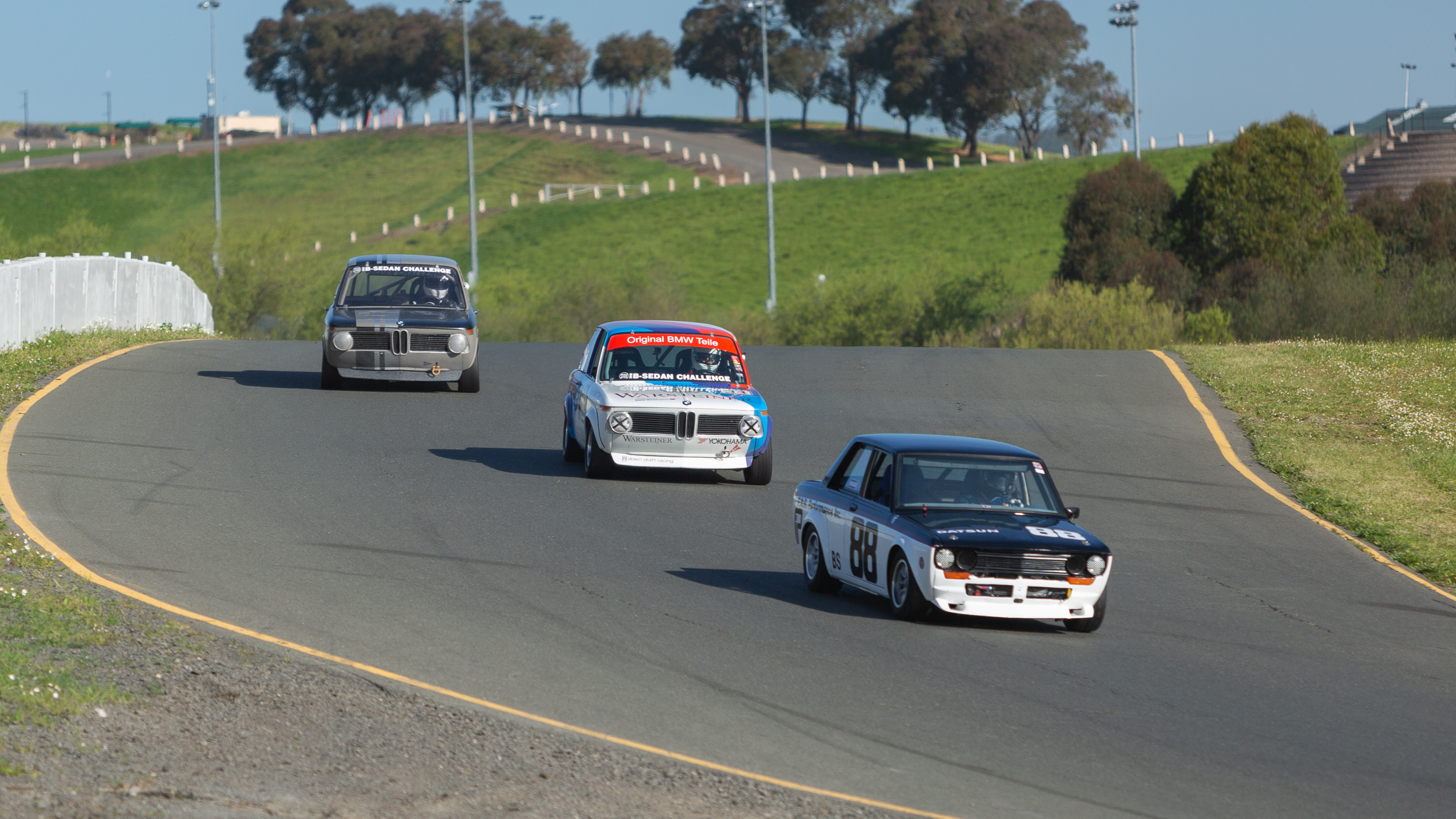 Battle of the B Sedans during the John Morton Cup race
