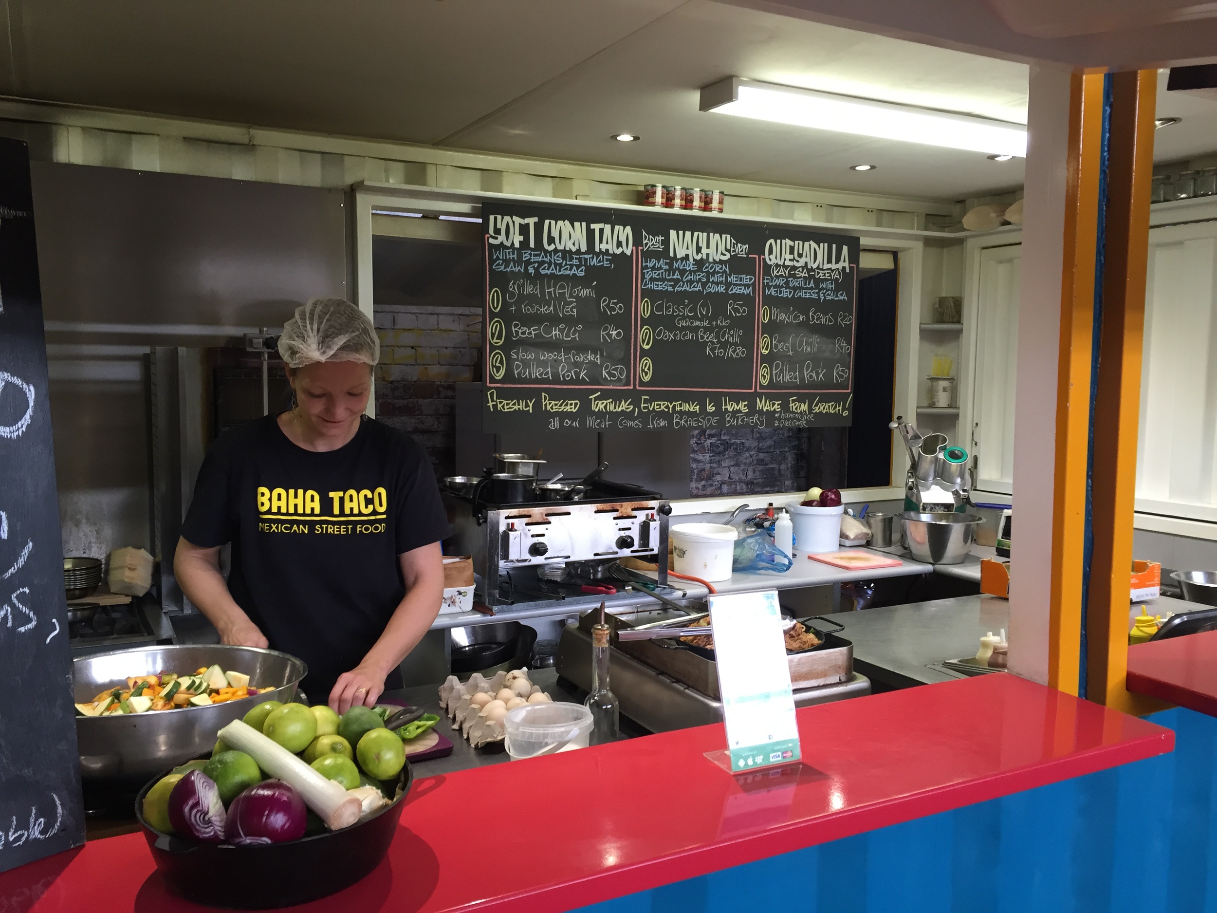 Get a great Mexican snack, scratch-made at the fabulous Baha Taco stall. Yum!