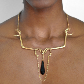 Talon and Onyx Gilt Necklace on Model.jpg