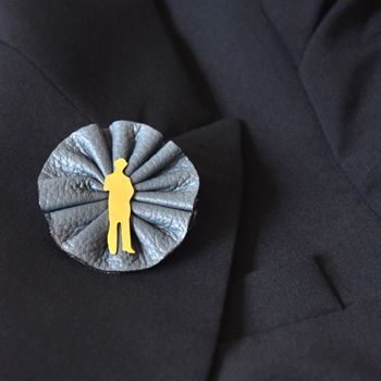 Brass Man with Leather Corsage.jpg