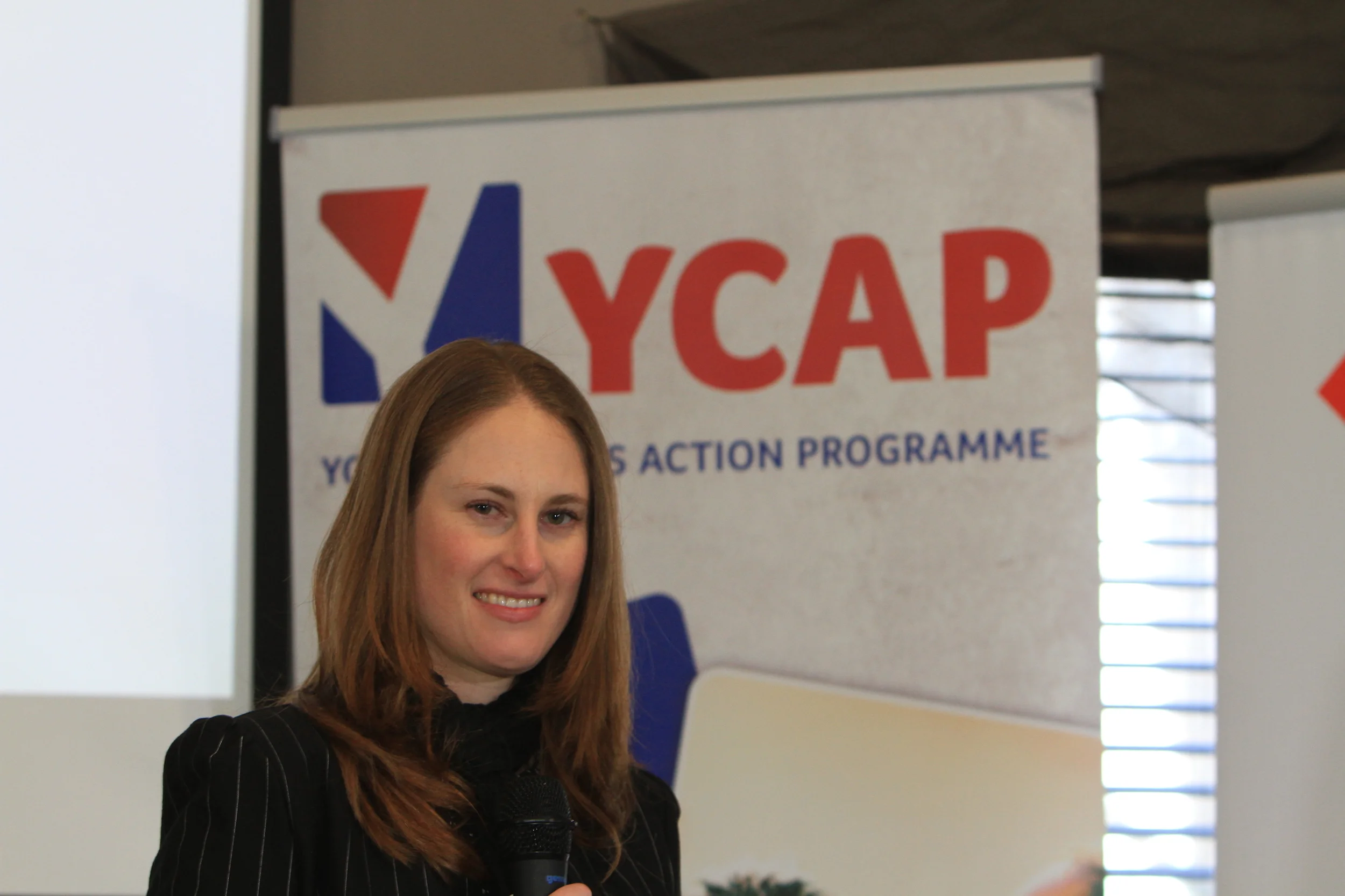 Amanda with ycap banner.jpg