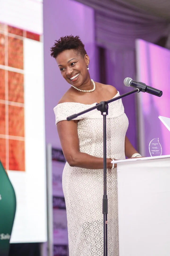 Brandbuilder founder receiving influencer award at #zimwomenroar.jpeg