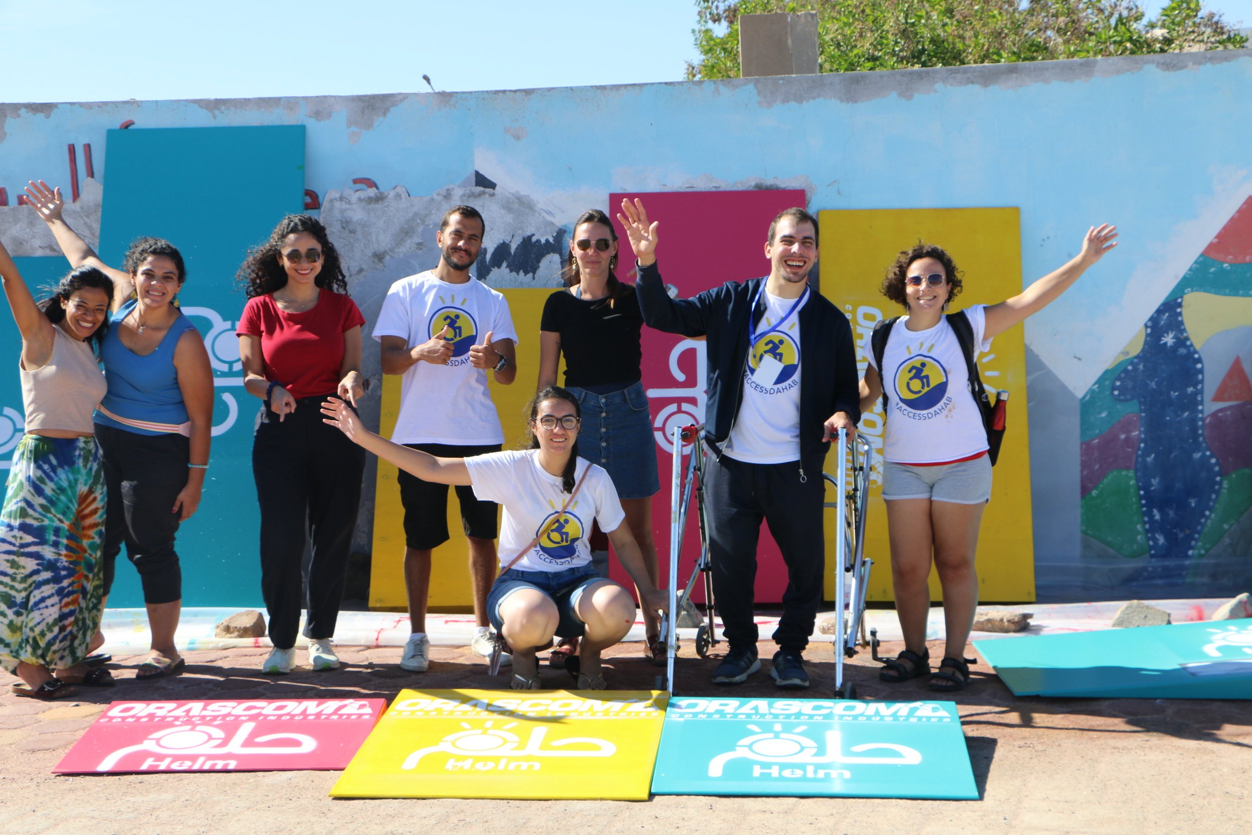 Access Dahab event - Helm team with volunteers and ambassador coloring ramps.JPG