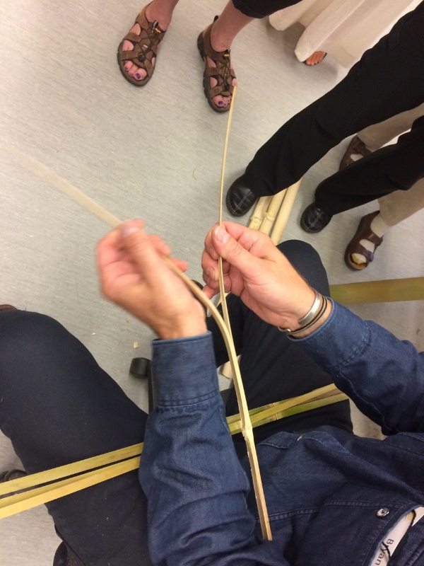 Peeling off the outer 1/3 of a 1cm strip. The inner bit will be discarded.