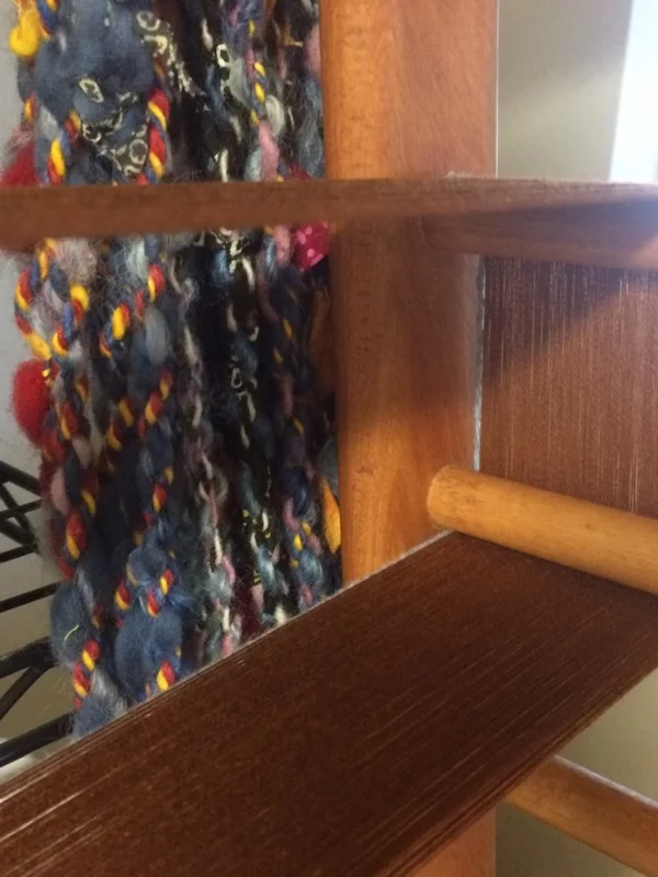 New warp on frame, with handspun Nomad Caravan peeking through.